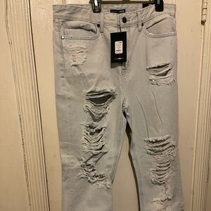 Distressed Light Blue Jeans